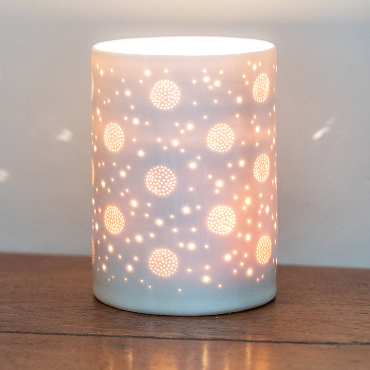 Thrown pierced porcelain lamp