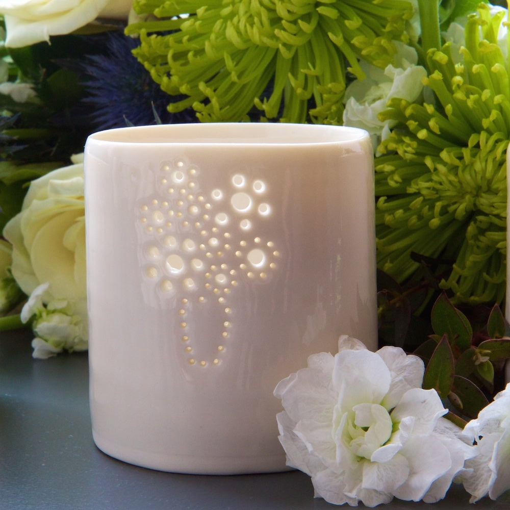 Porcelain ceramic tealight candle holder, featuring a design of a bouquet of flowers, in a vase. Natural glossy glaze. Birthday present. Celebration. Romance.