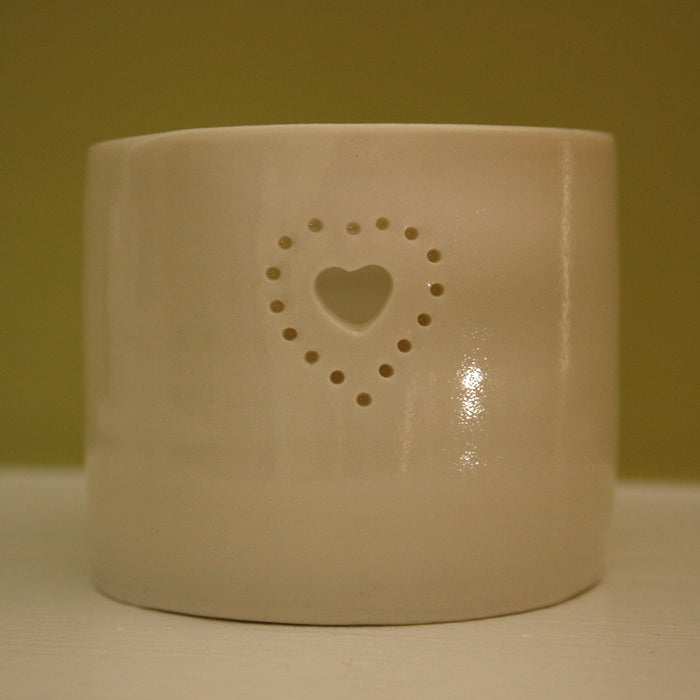 Natural glazed porcelain ceramic tea light candle holder, with a double heart design, pierced with tiny holes. Anniversary wedding valentines gift. Cute lovely present.