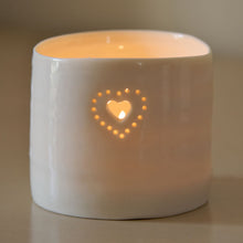 Load image into Gallery viewer, Natural glazed porcelain ceramic tea light candle holder, with a double heart design, pierced with tiny holes. Anniversary wedding valentines gift. Cute lovely present.