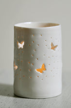 Load image into Gallery viewer, Porcelain tealight holder with butterfly design. Ceramic candle holder which glows from within.