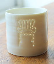 Load image into Gallery viewer, A porcelain tealight candle holder with a design of a midcentury classic chair. Ceramic candle holder. Homeware. Design. Interiors