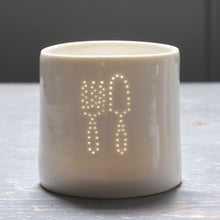 Load image into Gallery viewer, A gardener's present - this ceramic porcelain tealight candle holder features a fork and trowel. Garden tools. Outdoor lighting. Table decoration.