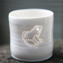 Load image into Gallery viewer, Cute little frog design. Porcelain candle holder with a sitting frog outline in pierced holes. Ceramic tealight holder. Wildlife. Outdoorsy present.