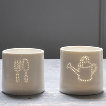 Load image into Gallery viewer, Green fingers present - this ceramic porcelain tealight candle holder features a fork and trowel design, and a watering can. Garden tools. Outdoor lighting. Table decoration. Glossy glaze creates a natural glow.