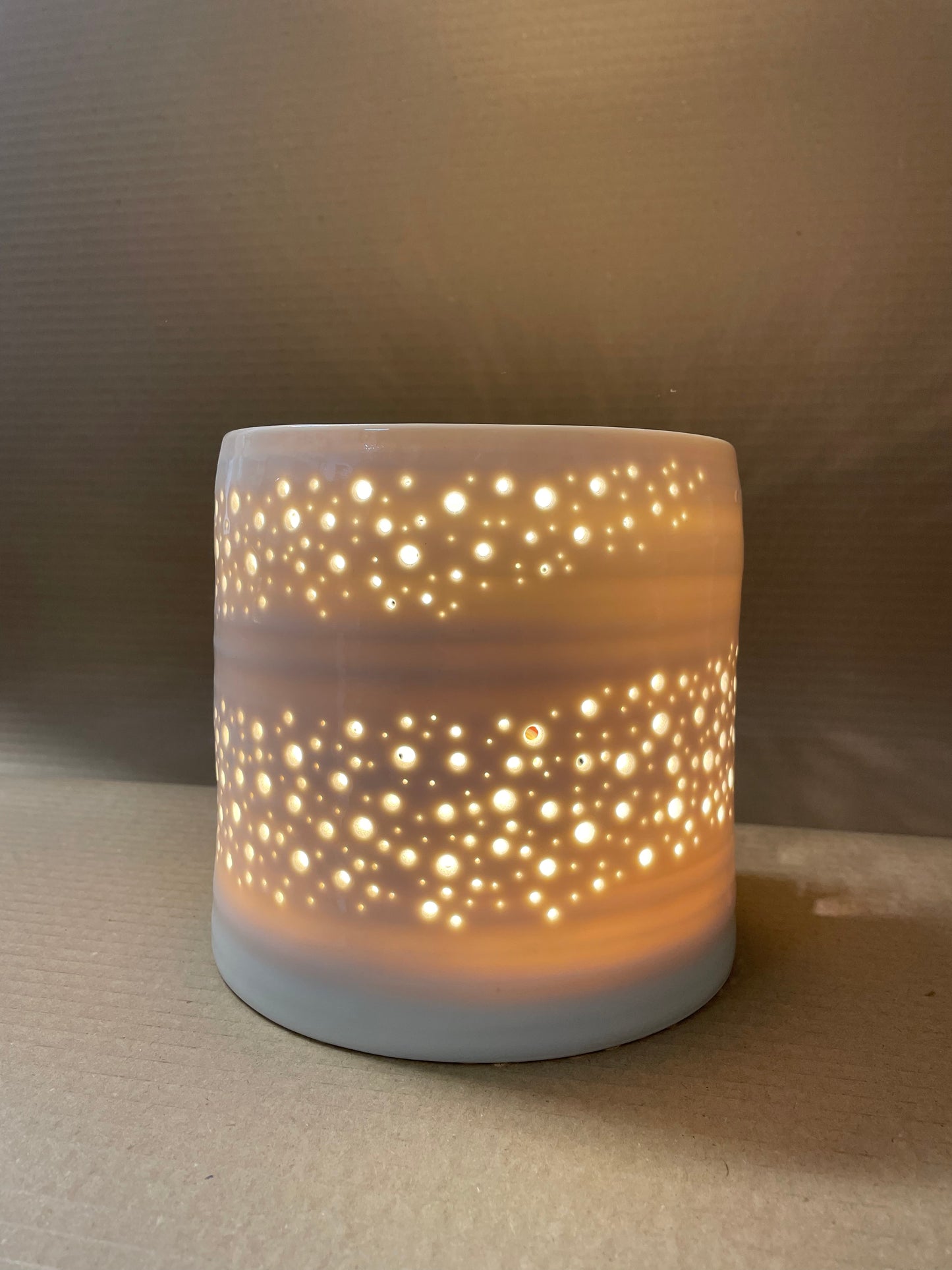 Thrown pierced porcelain lamp