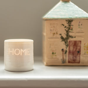Ceramic candle holder spelling out HOME. This porcelain tealight holder is perfect for New Home present, moving-in present, housewarming. Hygge.