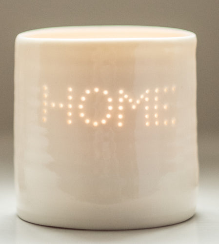 Ceramic candle holder spelling out HOME. This porcelain tealight holder is perfect for New Home present, moving-in present, housewarming. Hygge.