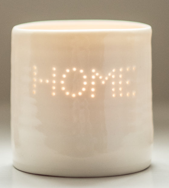 Ceramic candle holder spelling out HOME. This porcelain tealight holder is perfect for New Home present, moving-in present, housewarming. Hygge.