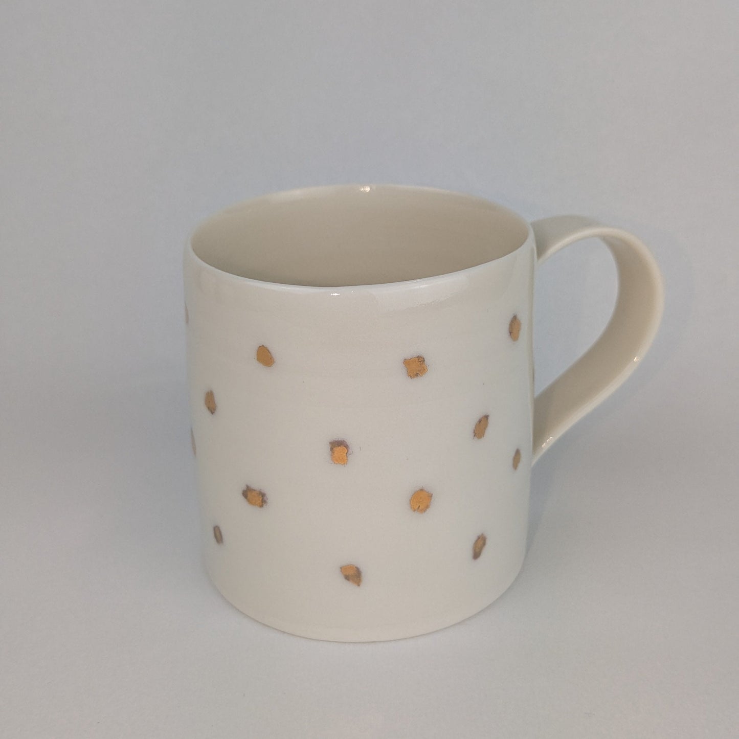 Gold Lustre porcelain cup with scribbly spots