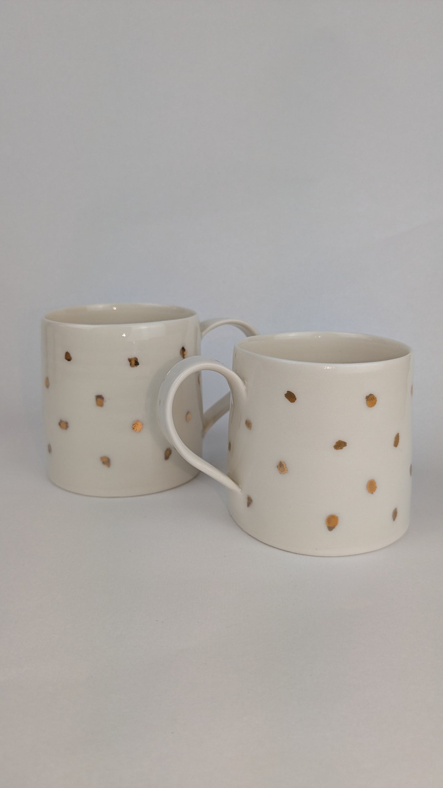 Gold Lustre porcelain cup with scribbly spots