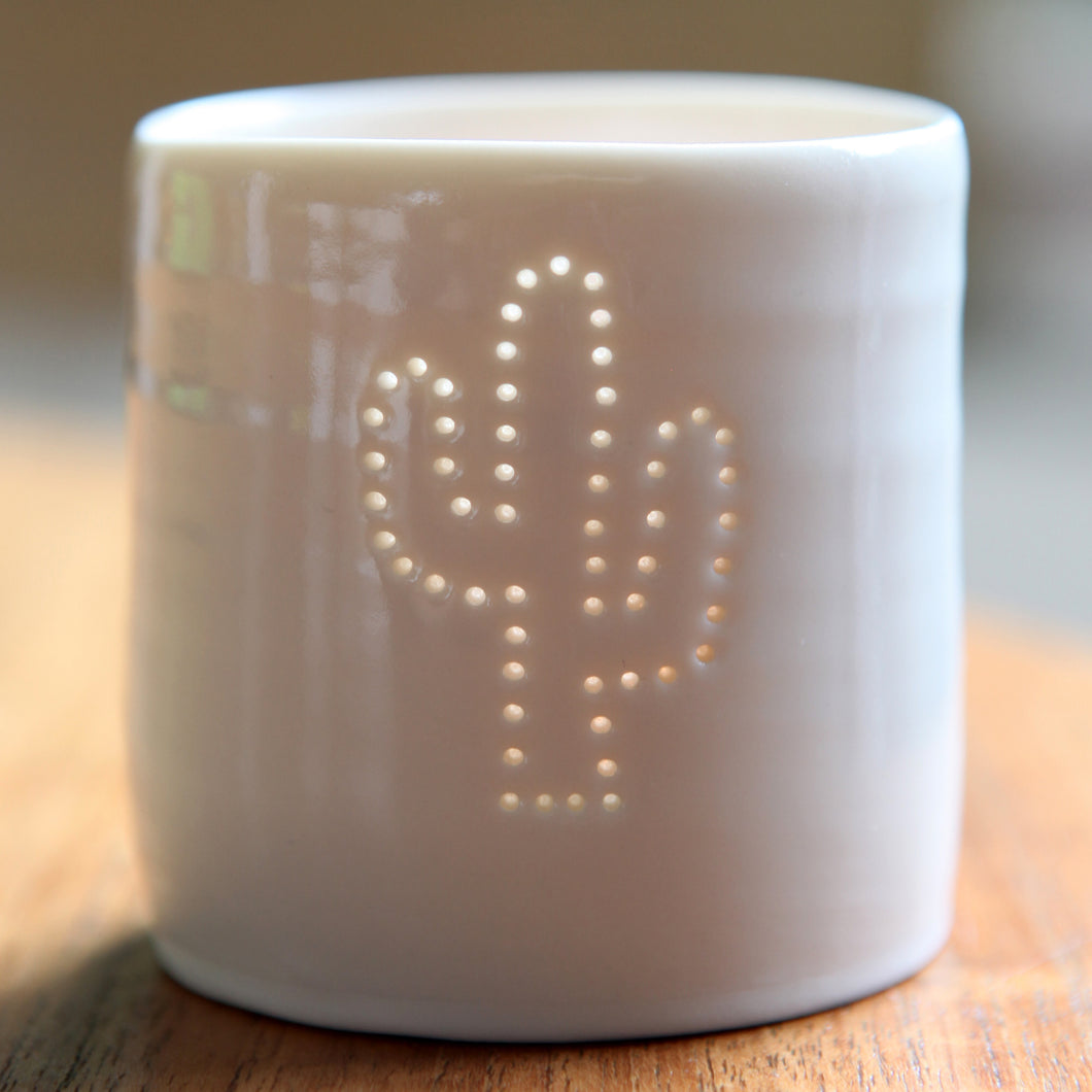 Porcelain tealight candle holder with a cactus design. Perfect for tequila lovers or sun seekers.