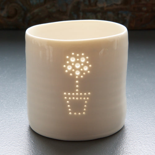 Porcelain tealight holder featuring a lemon tree design. Simple scandi chic. Interior design.