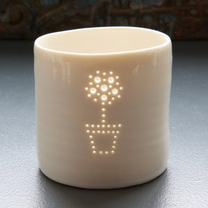 Porcelain tealight holder featuring a lemon tree design. Simple scandi chic. Interior design.