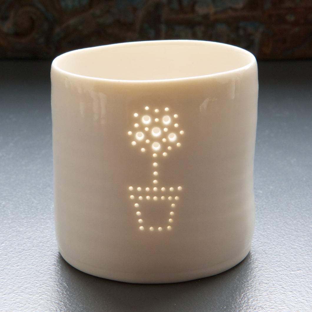 Porcelain tealight holder featuring a lemon tree design. Simple scandi chic. Interior design.