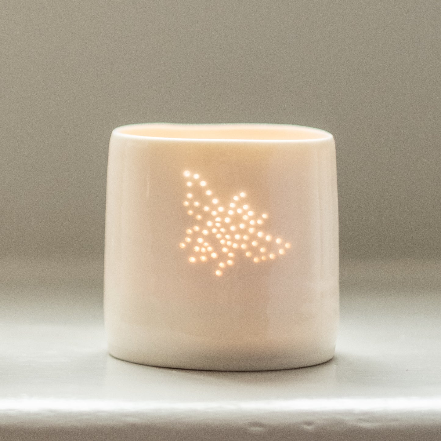 Porcelain ceramic tealight candle holder, featuring a design of a bumble bee, natural glossy glaze. Wildlife gift. Nature present.