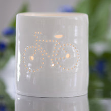 Load image into Gallery viewer, Porcelain ceramic tealight candle holder votive, featuring a design of a bike with a crossbar. Natural glossy glaze. Bicycle. Cycling gift. Fathers Day.
