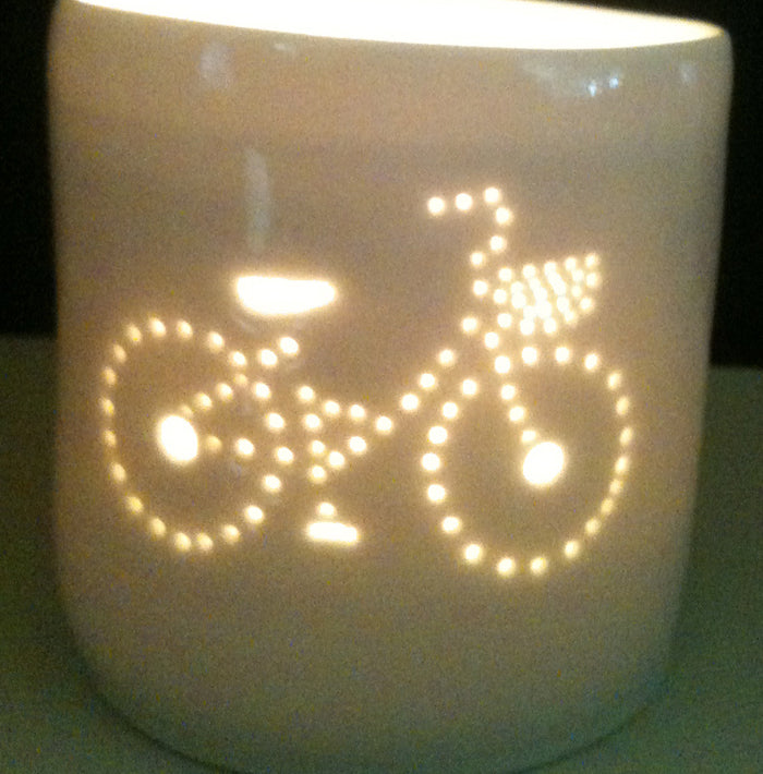 Porcelain ceramic tealight candle holder votive, featuring a design of a bike with a basket. Natural glossy glaze. Bicycle. Cycling gift. Illuminated.