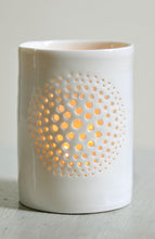 Load image into Gallery viewer, A natural porcelain ceramic tealight candle holder, with a floral design, resembling a large flower, like a dandelion. Homeware and garden decoration. Porcelain tableware.
