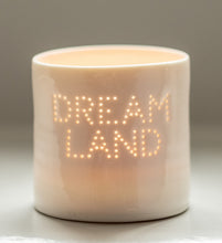 Load image into Gallery viewer, A handmade porcelain tealight holder. This ceramic candle holder spells out the word &quot;dream land&quot;. Small business. Relaxing candles. Uplifting gift.
