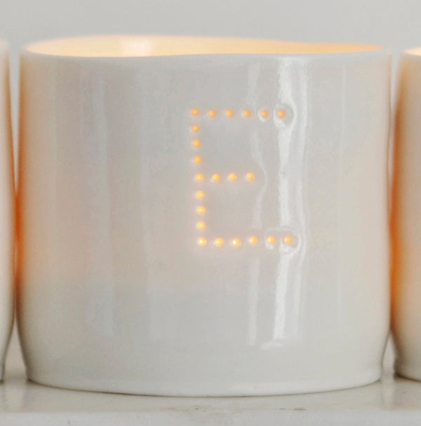 Ceramic candle holder with the letter E. Personalised porcelain tealight holder.