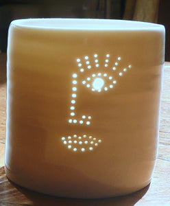 Face design tealight holder. Yoga and relaxing candles. Natural glossy glaze, glowing from within.