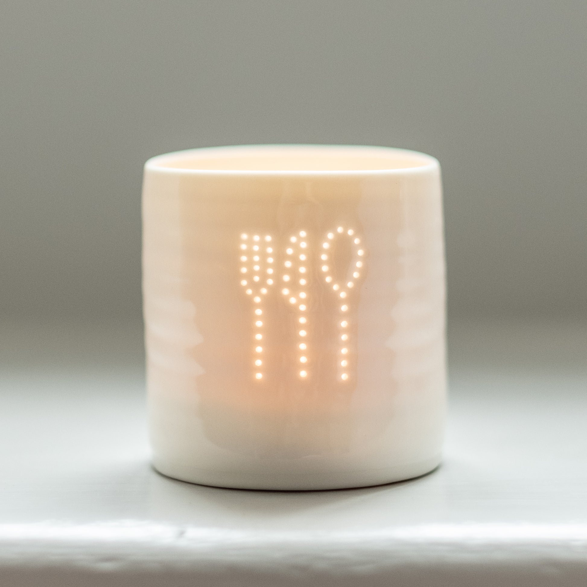 Foodie gift, this ceramic tealight holder has a fork, knife and spoon. Restaurant table decoration. Foodie present.