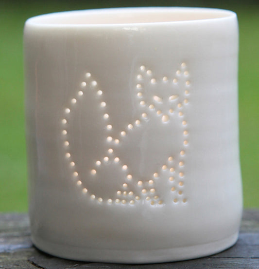 Ceramic candle holder, this features a fox design pierced with tiny holes. Urban wildlife, foxes, vixen.