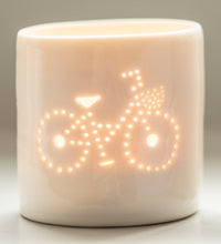 Load image into Gallery viewer, Porcelain ceramic tealight candle holder votive, featuring a design of a bike with a basket. Natural glossy glaze. Bicycle. Cycling gift. Twinkling.
