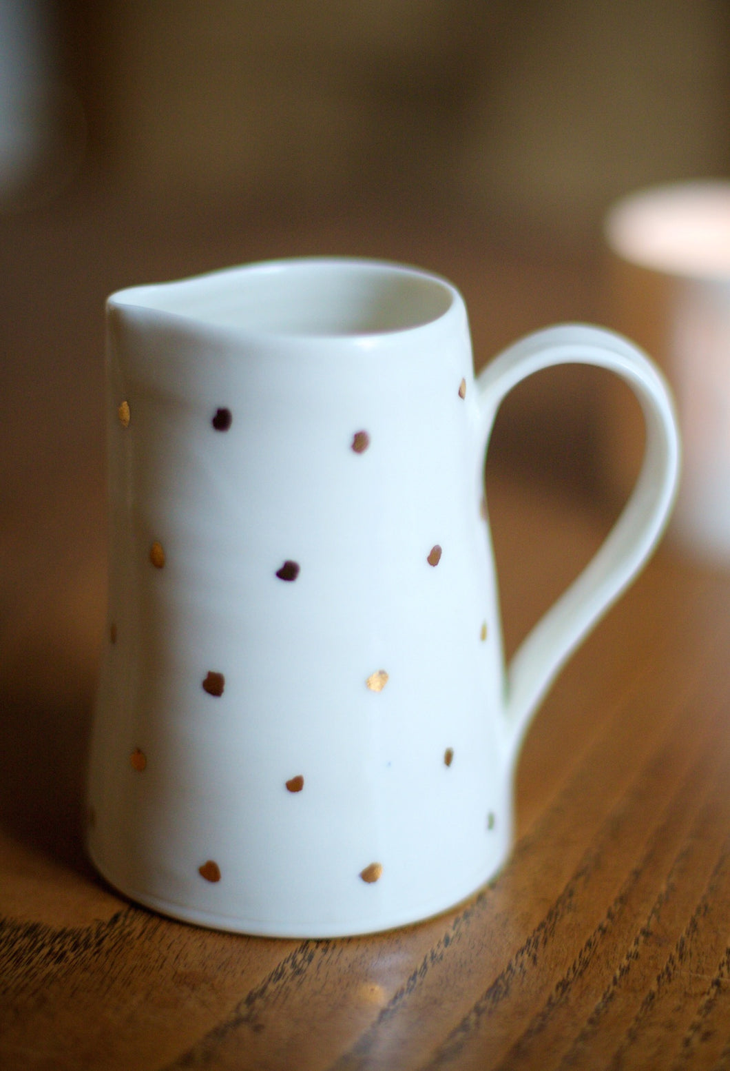 Gold Lustre small porcelain jug with small spots