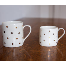 Load image into Gallery viewer, Gold Lustre porcelain cup with small spots

