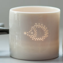 Load image into Gallery viewer, Cute hedgehog design candle holder. Porcelain ceramic tealight holder with adorable hedgehog design.
