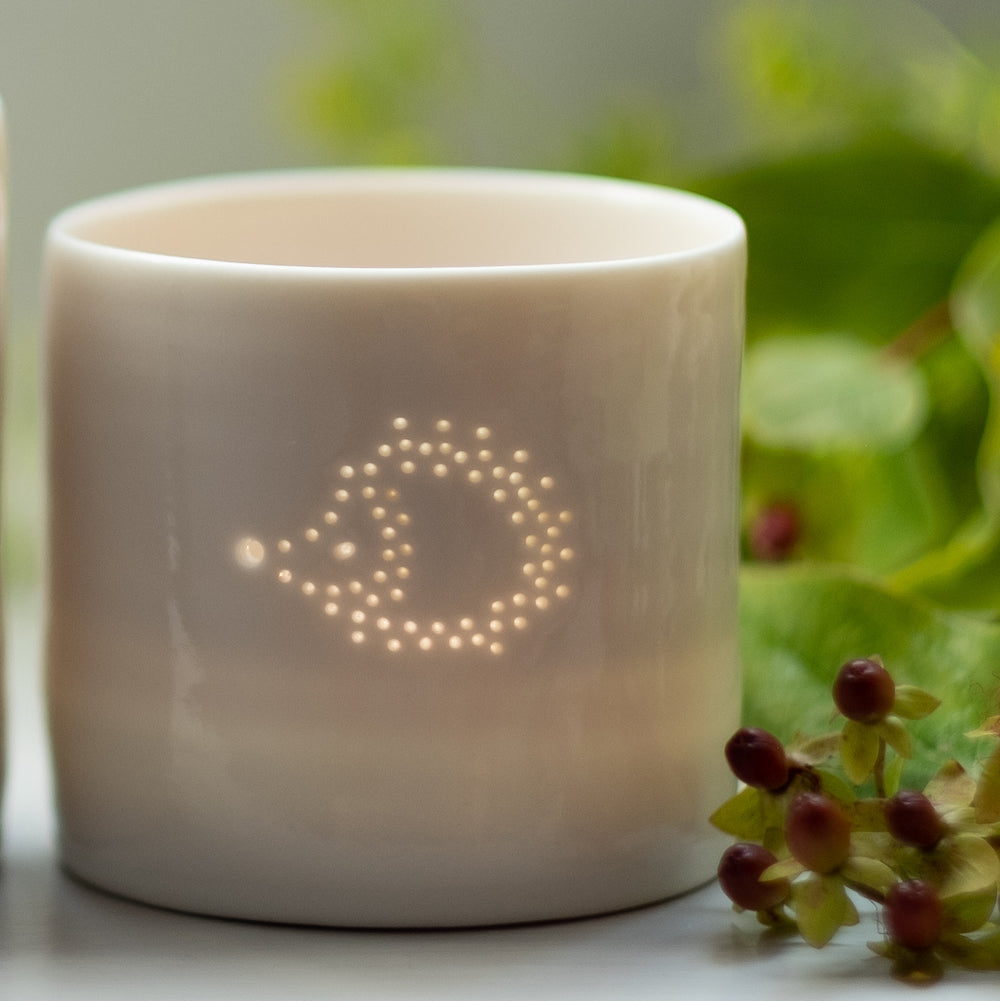 Cute hedgehog design candle holder. Porcelain ceramic tealight holder with adorable hedgehog design.