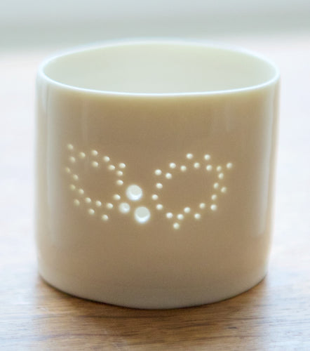 Christmas decoration - porcelain candle holder with a Holly design. The light shines through the holes. Christmas gift, Christmas present.