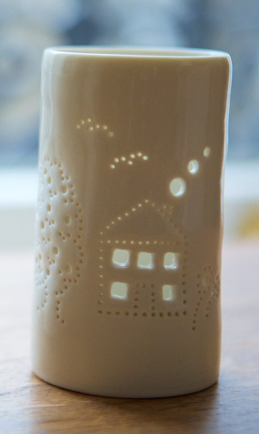 Ceramic tealight holder, with a house and garden design. Perfect for housewarming present, homeware, decoration. Get in the "hygge" mood with this porcelain candle holder.