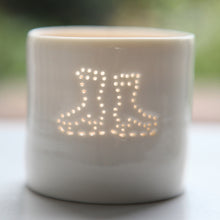 Load image into Gallery viewer, Ice skating, this ceramic porcelain tealight candle holder is a wintery treat. Homeware, Christmas and decoration.
