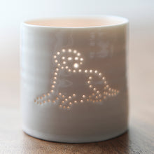 Load image into Gallery viewer, A ceramic tealight holder with a design of a Labrador lying down. This porcelain candle holder is simple and scandi chic.
