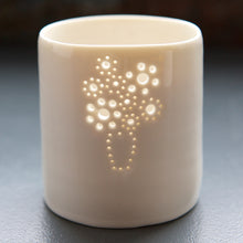 Load image into Gallery viewer, Porcelain ceramic tealight candle holder, featuring a design of a bouquet of flowers, in a vase. Natural glossy glaze. Birthday present. Celebration. Romance.
